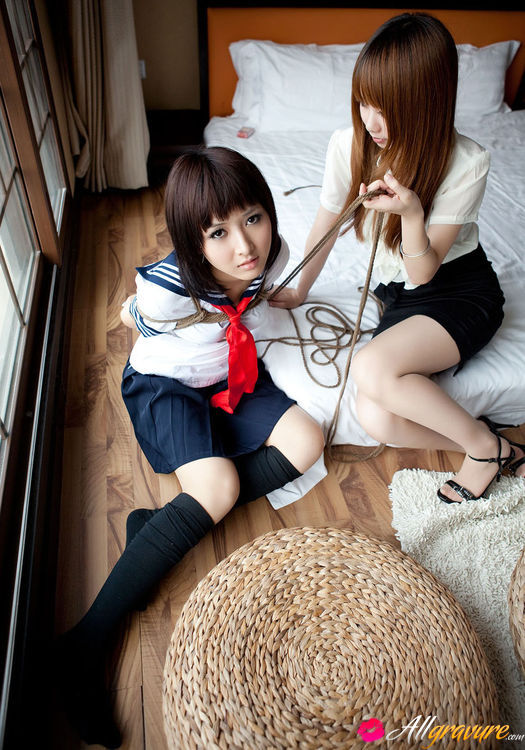 525px x 750px - Dimdim Asian in uniform is tied in ropes by another sexy cupcake